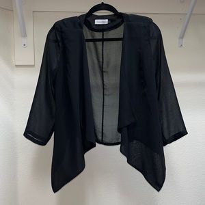Calvin Klein black blazer. Size medium. Gently used.